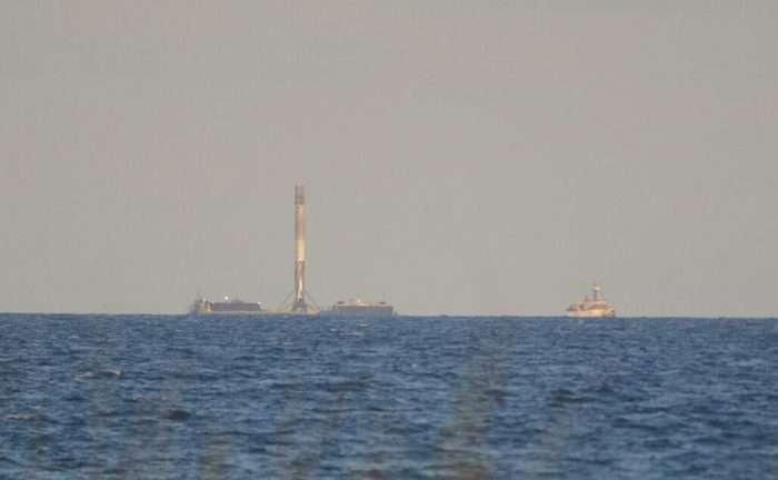 Recovered SpaceX Falcon 9 booster headed back to port