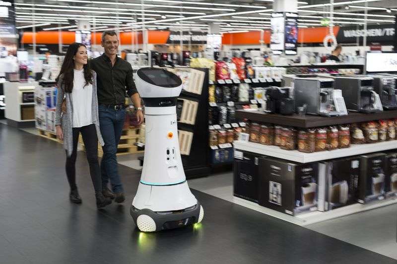 Robotic store greeter assists customers