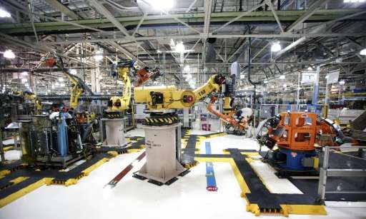 Robots at the Fiat Chrysler Automobiles US Warren Stamping Plant are seen in Michigan