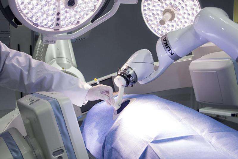 Robots help position interventional needles