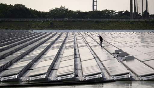 Scarcity of land has seen some solar farms in Japan built on water, such as this one near Yokosuka city