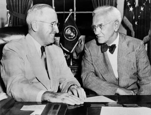 Scottish biologist Alexander Fleming, pictured (R) in 1949 with US president Harry Truman, was cleaning bowls in his lab when  n