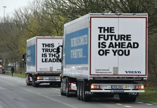 Semi-automated trucks are driven on the E19 highway in Vilvoorde on April 5, 2016 as part of the 'EU Truck Platooning Challenge'