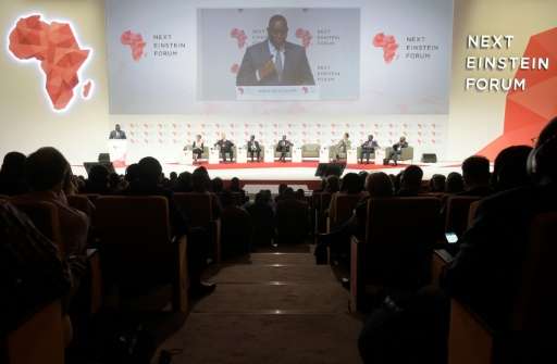 Senegalese President Macky Sall (L) delivers a speech in Dakar, during the opening of the &quot;Next Einstein Forum&quot; (NEF) 