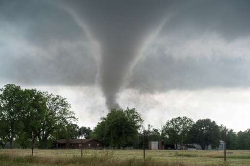 Several massive tornadoes have churned above and touched down in Oklahoma killing at least two