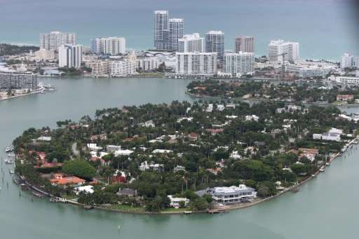 Single family homes on islands and condo buildings on ocean front property are seen in Miami Beach, Florida