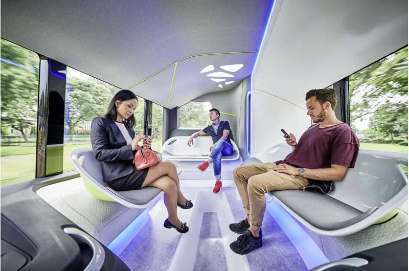 Smiling, hands-free driver sets comfort mood in Mercedes-Benz Future Bus