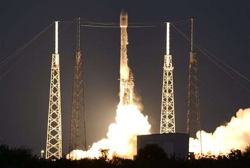 SpaceX launches satellite, but fails to land rocket on barge