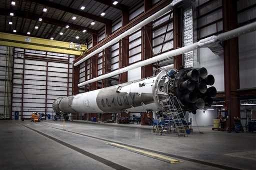 SpaceX's returned booster rocket back in hangar