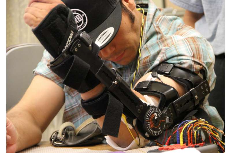 Stimulator bypasses spine injury, helps patients move hands