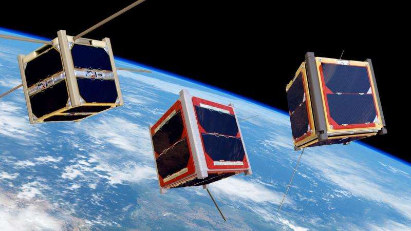 Student satellites fly freely on their orbit in space