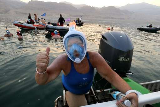 Swimmers taking part in a 17-kilometre swim from Jordan to Israel across the Dead Sea November 15, 2016 wore specially designed 