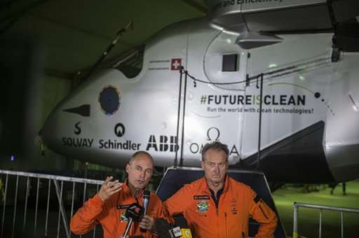 Swiss pilots Andre Borschberg (R) and Bertrand Piccard (L) took turns captaining the Solar Impulse 2 across four continents, two
