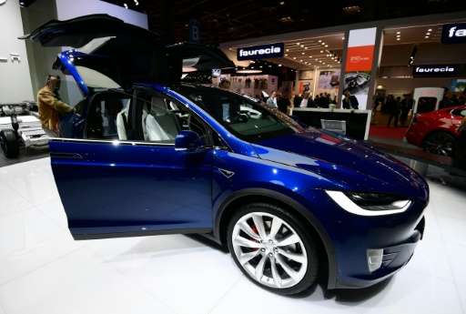 Tesla will build self-driving technology into cars which will run in &quot;shadow mode&quot; to gather data on when it might hav