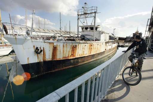 The famous ship of late French oceanographer Jacques Cousteau, the Calypso, is docked at the port of La Rochelle on November 17,