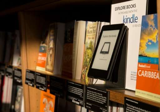 The new Amazon Kindle weighs in at 161 grams, or 5.7 ounces, with a six-inch display