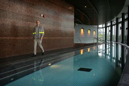 The three mineral-infused pools in the glass-walled spa, each with a different temperature, are powered by the heat from the bur