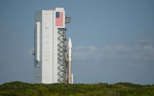 The United Launch Alliance Atlas V rocket with NASA OSIRIS-REx spacecraft on board rolls out of the Vertical Integration Facilit