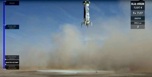 This June 19, 2016 screenshot courtesy of Blue Origin from the live webcast shows the New Shepard rocket about to land at a site