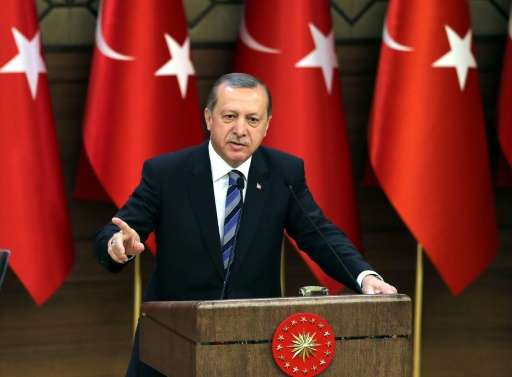 Turkish President Recep Tayyip Erdogan delivers a speech during a ceremony on the occasion of 171st anniversary of foundation of
