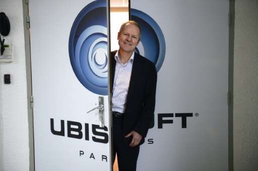 Ubisoft co-founder Yves Guillemot poses for a photo at the company studios in Montreuil, outside Paris, in 2013