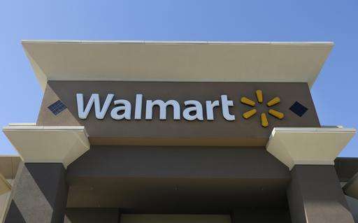 Wal-Mart plans to slow new store openings, invest in online