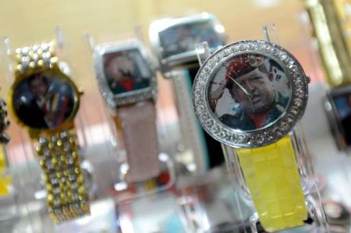 Watches with images of Venezuelan President Hugo Chavez at a shop in Caracas on January 7, 2012