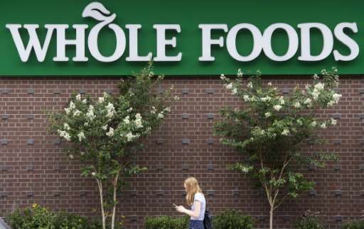 Analysts say US regulators are unlikely to block Amazon's proposed $13.7 billion purchase of Whole Foods