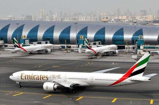 AP Interview: Emirates defends security as laptop ban looms
