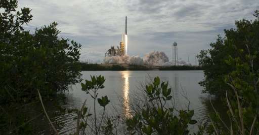 A SpaceX Falcon 9 rocket launches from NASA's Kennedy Space Center in Cape Canaveral, Florida in June