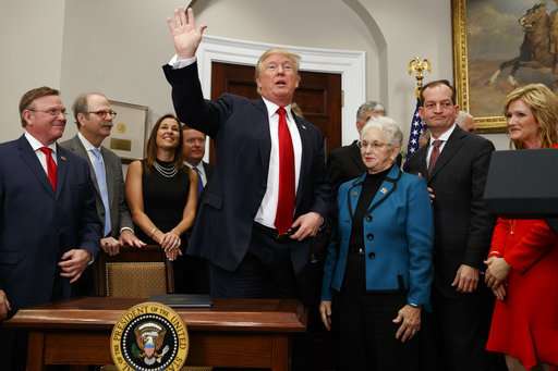Calling it a beginning, Trump signs health care order