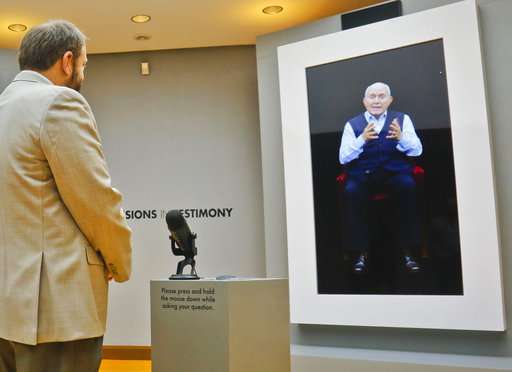 Exhibit allows virtual 'interviews' with Holocaust survivors