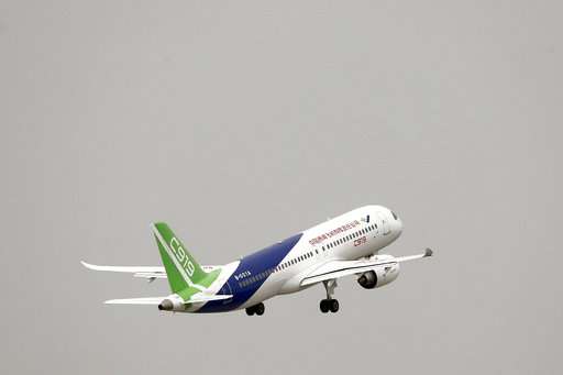First large Chinese-made passenger jet makes its maiden flight