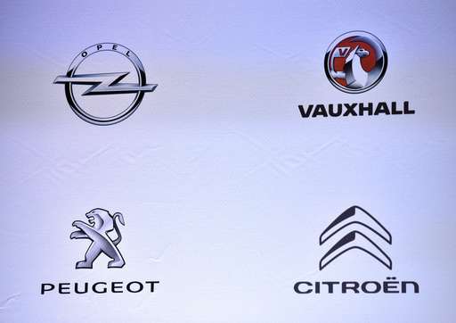 GM sells European brands to France's Peugeot