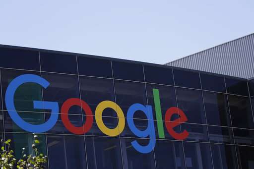 Google parent books $2.7B fine as European fight looms