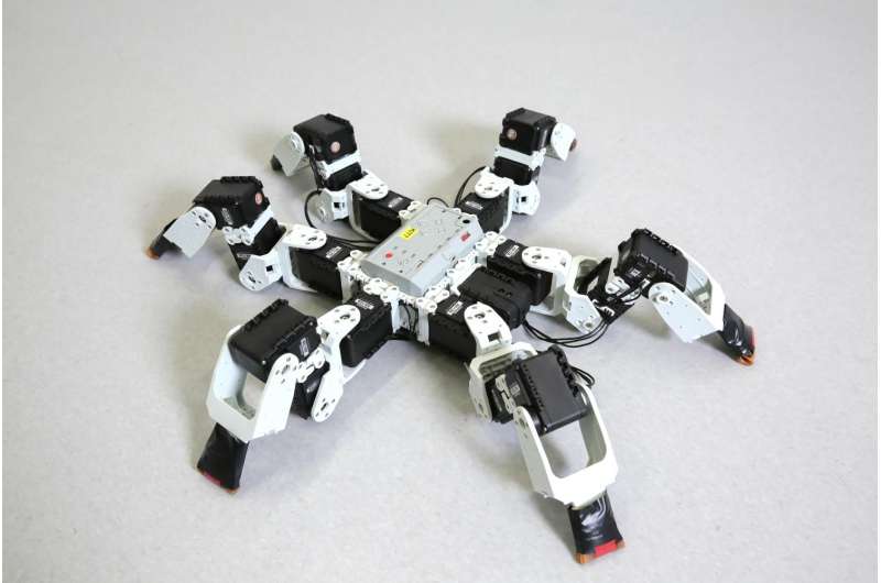 Six-legged robots faster than nature-inspired gait
