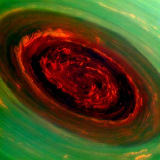 The spinning vortex of Saturn's north polar storm is seen from NASA's Cassini spacecraft on November 27, 2012