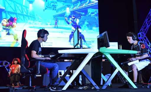 Visitors to the Tokyo Game Show are left in little doubt they are entering a male-dominated world.