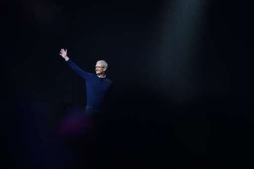 Apple CEO Tim Cook, seen at the Apple Worldwide Developer Conference on June 5, 2017, says autonomous driving systems will be a 
