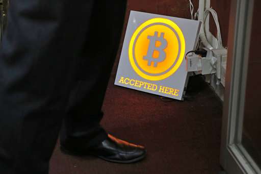 Asian investors embrace bitcoin, but regulators are wary