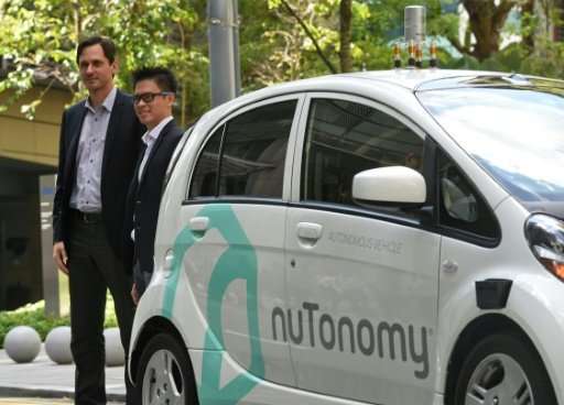 Autonomous cars developed by the US tech firm nuTonomy, such as one seen here in Singapore in 2016, will be hitting the streets 