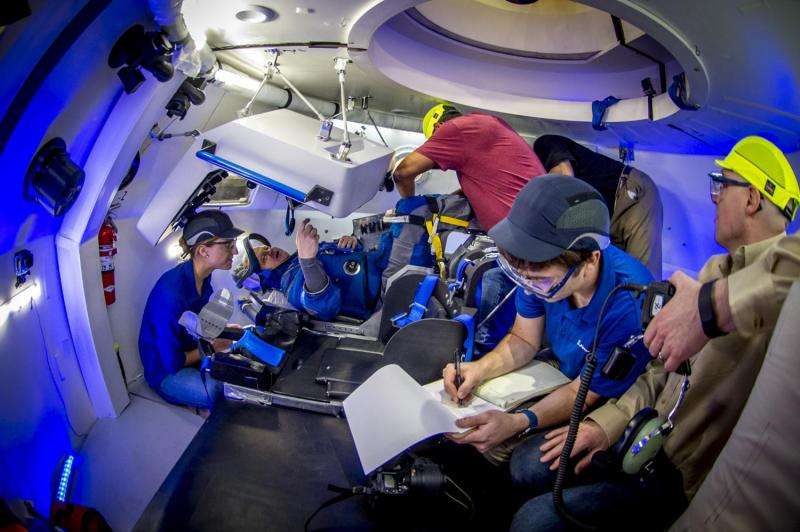 Boeing unveils blue spacesuits for Starliner crew capsule