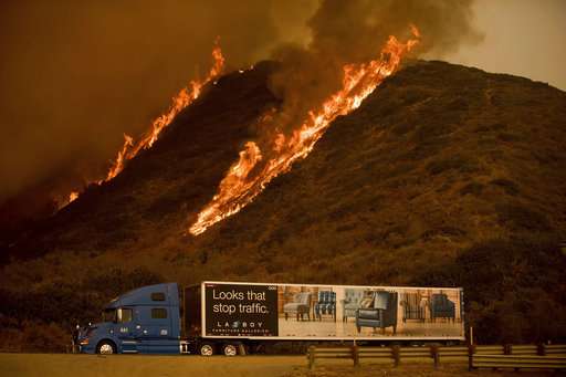 Forecast of higher winds could complicate wildfire fight