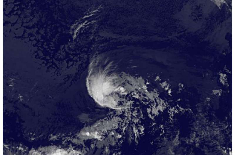 Satellite shows Tropical Storm Greg being affected by wind shear