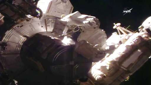 Spacewalkers lose piece of shielding, use patch instead