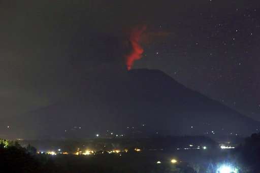 Bali volcano dusts resorts in ash; Lombok airport closes