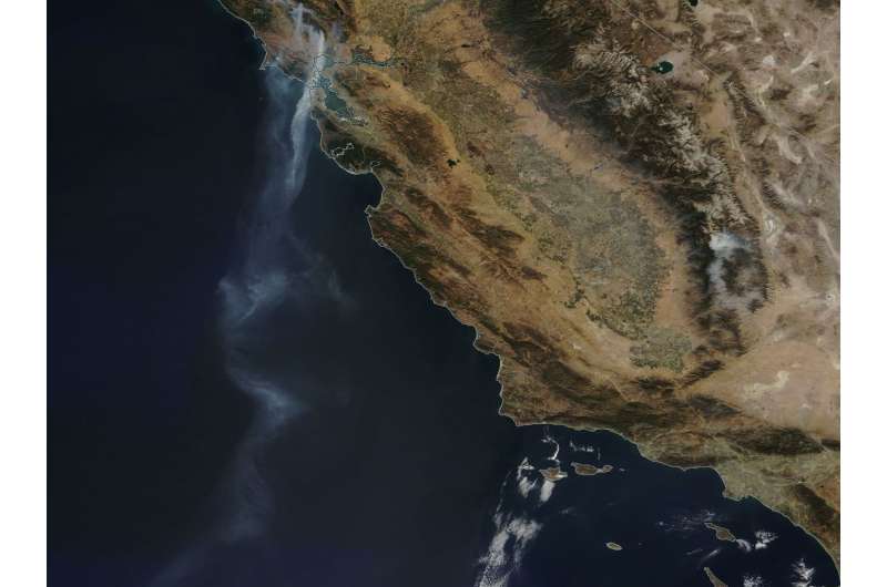 NASA satellite sees a tail of smoke over 500 miles long from California fires