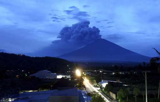 Bali volcano ash drifts 4.7 miles high, airport shut 3rd day