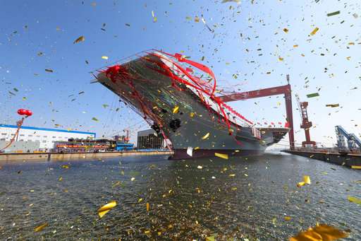China launches 1st domestically-made aircraft carrier