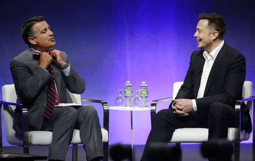 Elon Musk talks cars -- and humanity's fate -- with governors